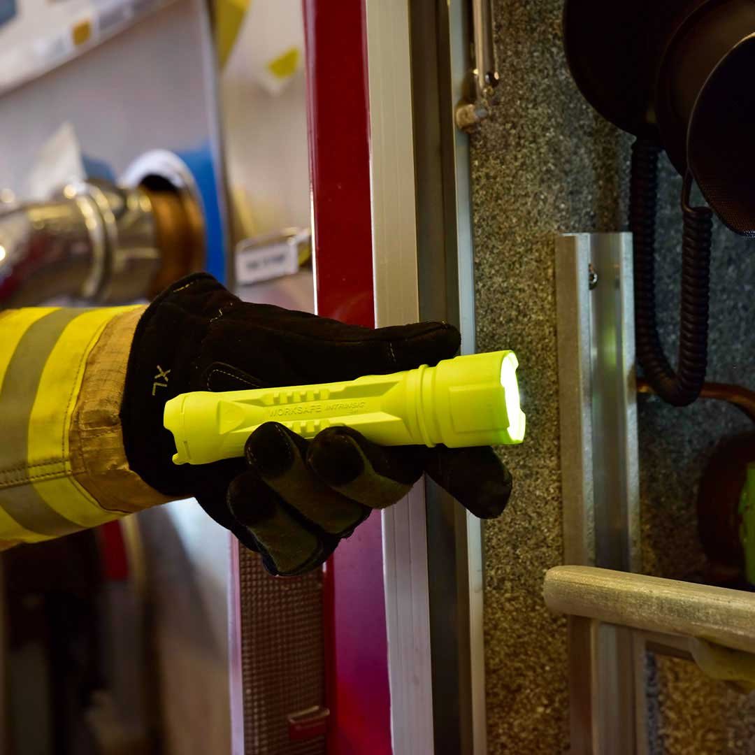 firefighter using razor led flashlight
