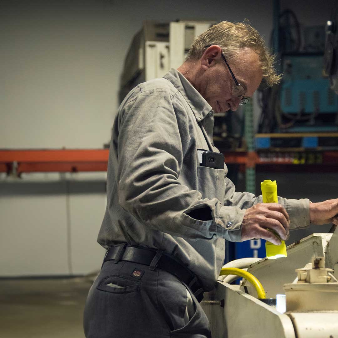 worker using razor led flashlgiht